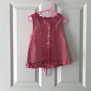 This room seven Tank top is a small pink button up